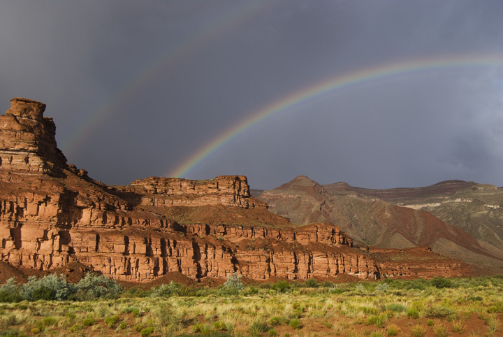 sandstone mesas with rainbow